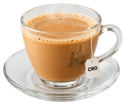 A cup of chai with a CRO tea bag
